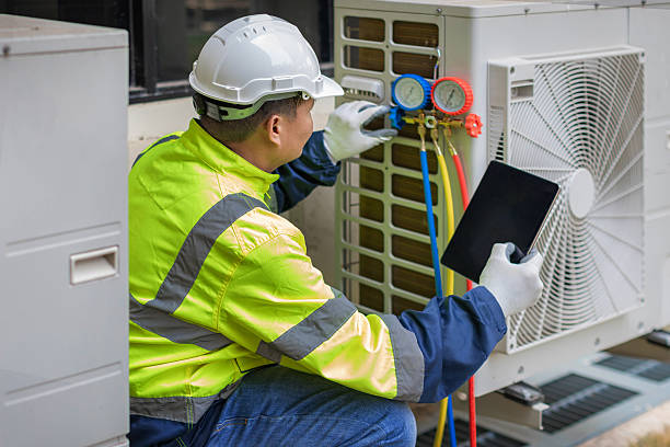 Professional Air Conditioning Repair technician working in Twelve Mile, IN